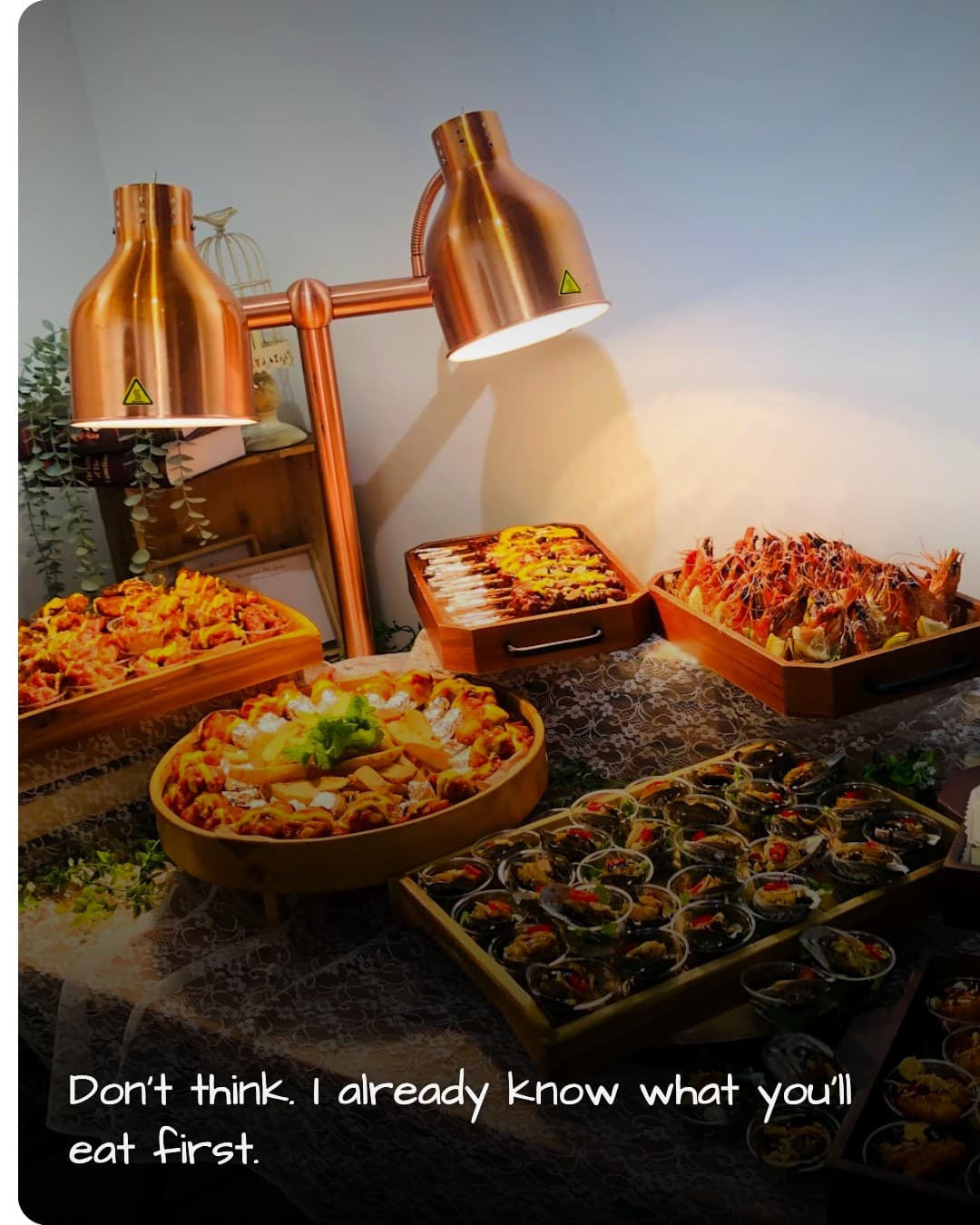 Waoak Korean buffet spread under copper lamps