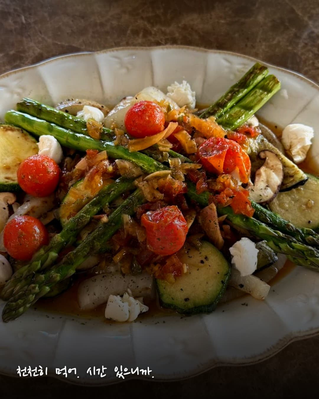 Arch Seoul Yongsan plated meal with asparagus and cherry tomatoes