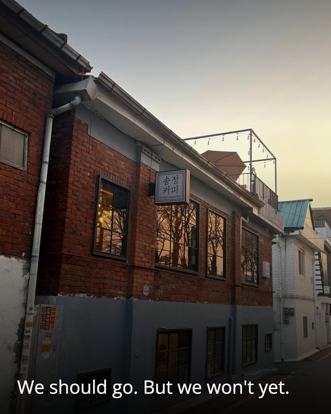 Songjeong Coffee exterior at dusk