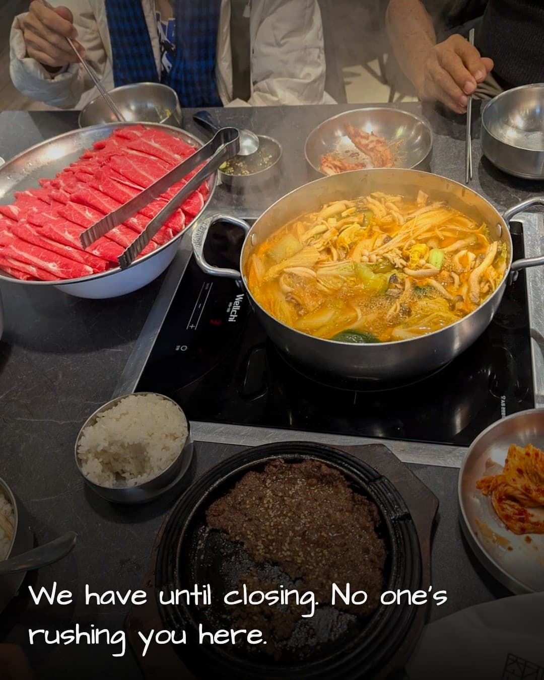 Choigane Shabu Beoseot Kalguksu Seongsu two pots cooking at table