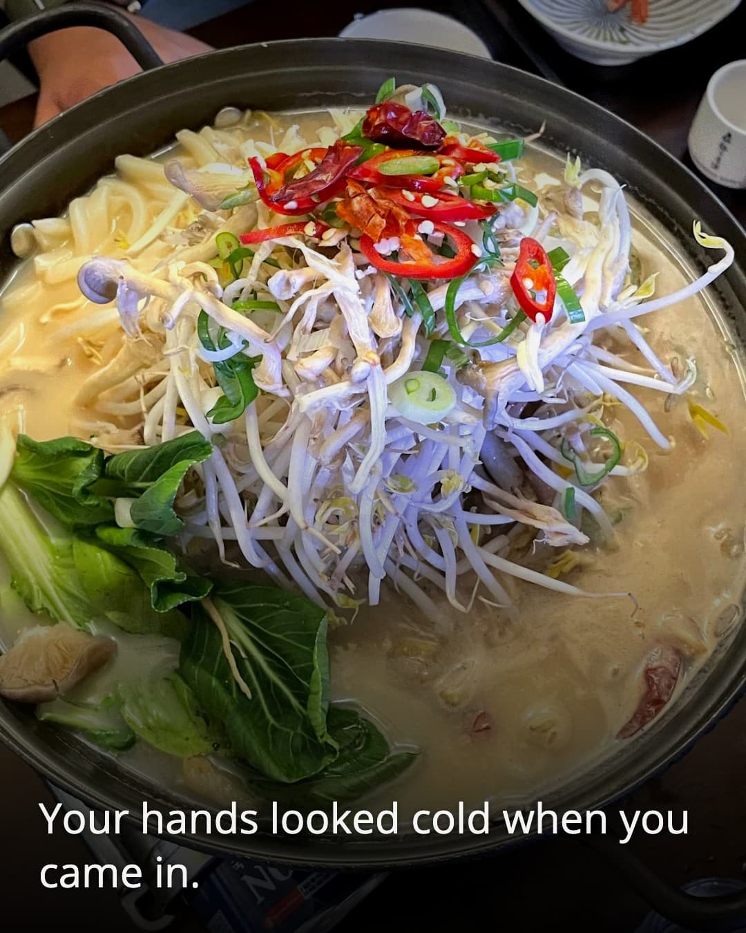 Cheonjan hot pot bubbling with sprouts and chilies