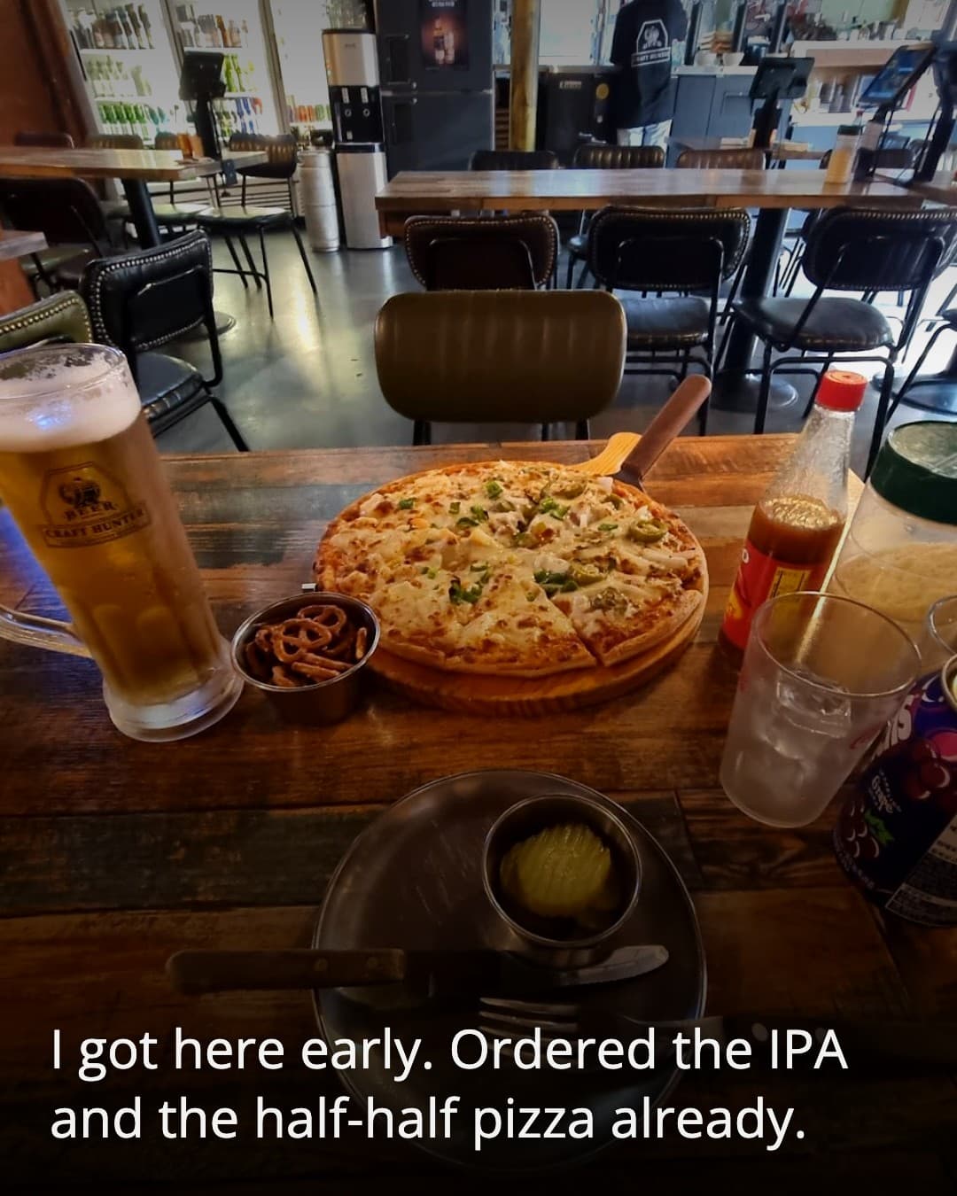 Craft Hunter, table set with beer and pizza